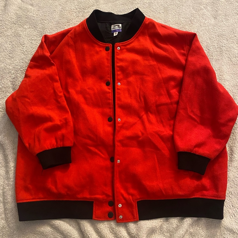 This is a Future Collective with Kahlana Barfield Brown red bomber jacket.
